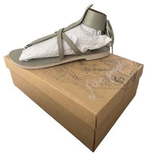 Free People NEW
Vacation Day
Strappy Leather
Wrap Sandals Sky size 41 US Size 10